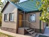 Дом обшитый металлическим сайдингом с внешними углами